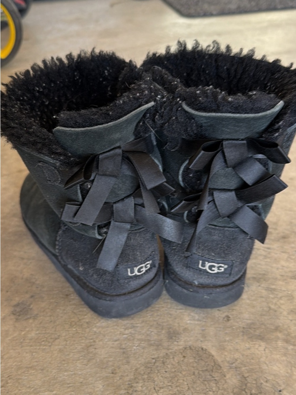 UGG Bailey Bow Black Short Suede Boots with Back Ribbon Detail